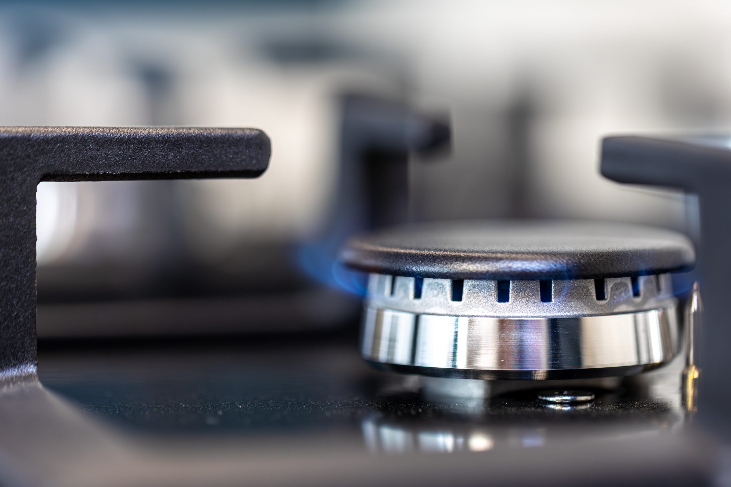 modern-gas-burner-blue-flame-macro-technical-detail Close-up view of an active gas burner emitting a blue flame. Sleek modern kitchen appliance with fine detail and metallic texture. SSUCv3H4sIAAAAAAAAA41Py46DMAz8F5+DFKBLm/xK1UMehloFUiXOViuUf1+FUu11bzO25+ENyIMGJa3rcZTNuVdD07ajbJQ5nRs5DhZt51vVIQjwhhF02/dKtd3pa1CXSyellAKsSeRAb0DznBNHwxRW0FJAxNVj3CF64hDJzKBlEZDYcE6YQG9FgDOMU4i084/fdatz0AACUrYVFPHP2U2AmXB1P9W/1CIzmj3uehPweDHG5cgOfK8VK3xGcrROR6ecOCxvvAau2j2Bg3uQP8TvN+6UOMSaBfk5B+PRH+tsF2L+0IjfhK+/61LKL7ZVz6WEAQAA